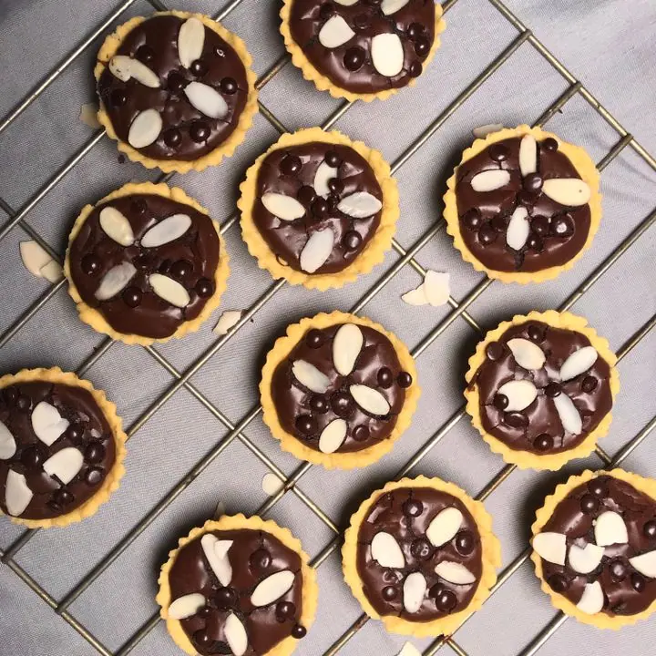 Chocolate Tarts — Shortcrust tarts filled with chocolate ganache.