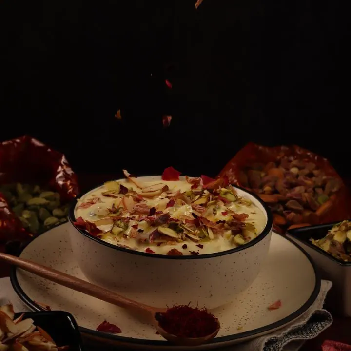 Rasmalai — Flattened chhena discs soaked in saffron-cardamom malai.