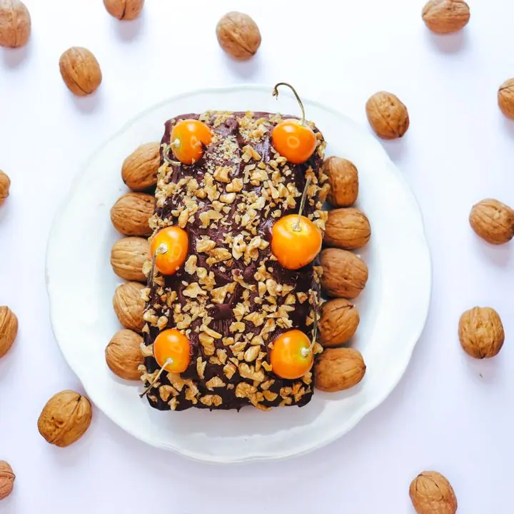 Chocolate Walnut Loaf — Chocolate tea cake topped with nuts.