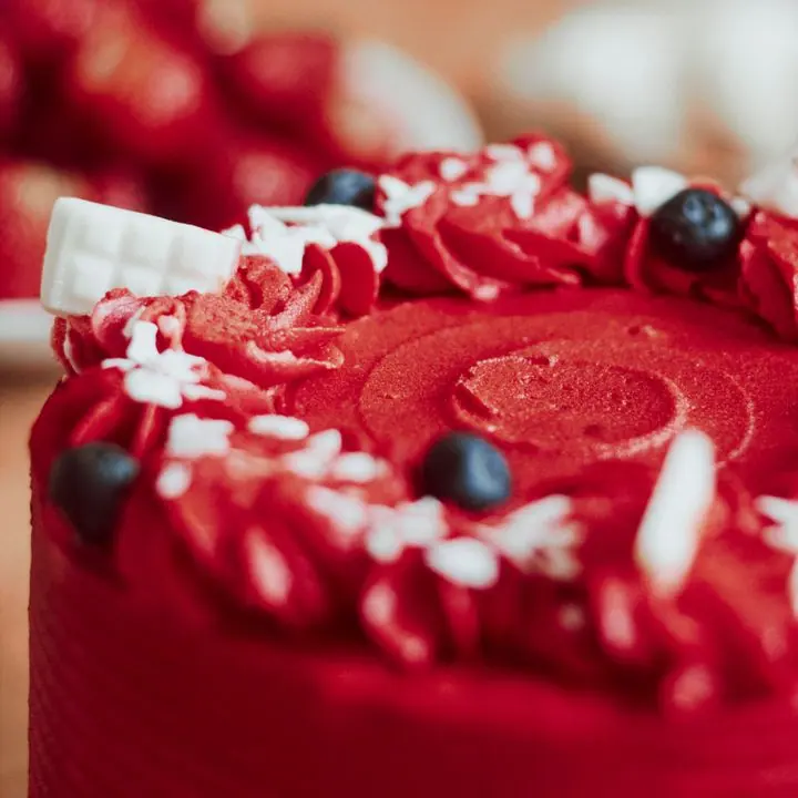 Red Velvet Cake — Cocoa-red sponge with cream cheese frosting.