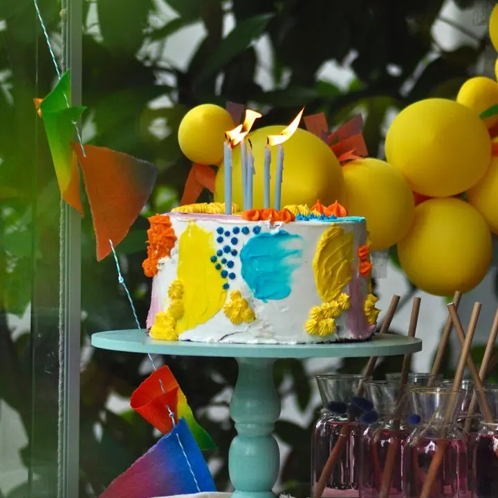 Rainbow Sprinkle Cake — A bright, sprinkle-covered cake for kids’ parties.
