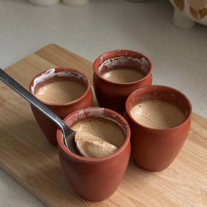 Mishti Doi (Earthen Pot) — Caramelised sweet curd set in a clay bhaar.