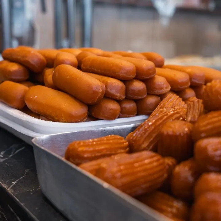 Langcha — Long, dark-fried sweets in the Shaktigarh style.
