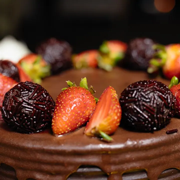 Chocolate Strawberry Cake — Chocolate cake crowned with strawberries and truffles.