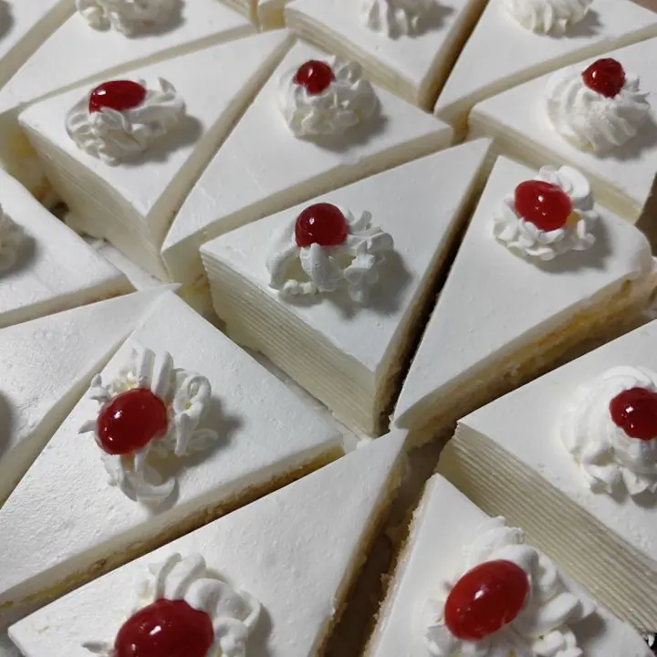 White Forest Pastry — Vanilla sponge, white chocolate and cherry.