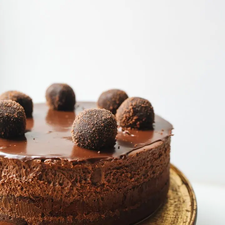Chocolate Truffle Cake — Dark chocolate sponge, truffle layers and ganache.