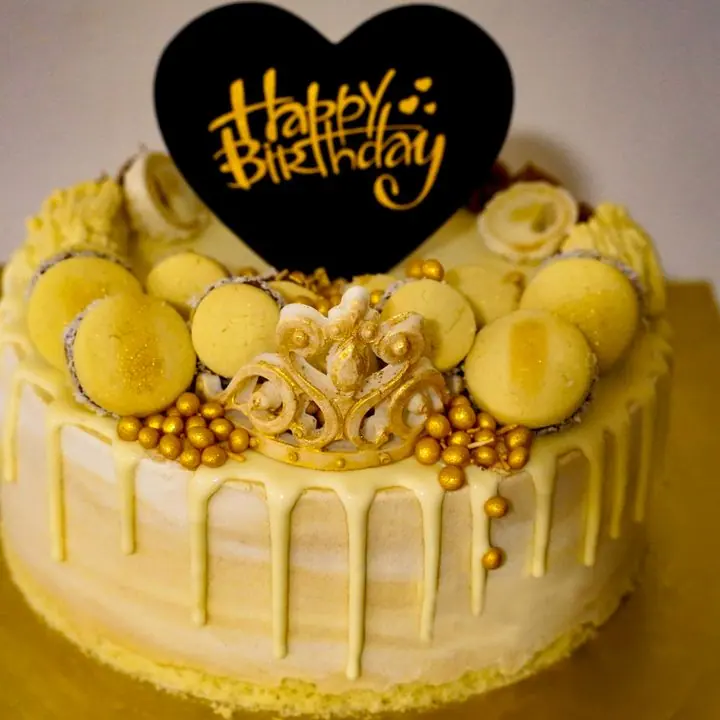 Butterscotch Celebration Cake — Butterscotch cream, caramel drip and a party topper.